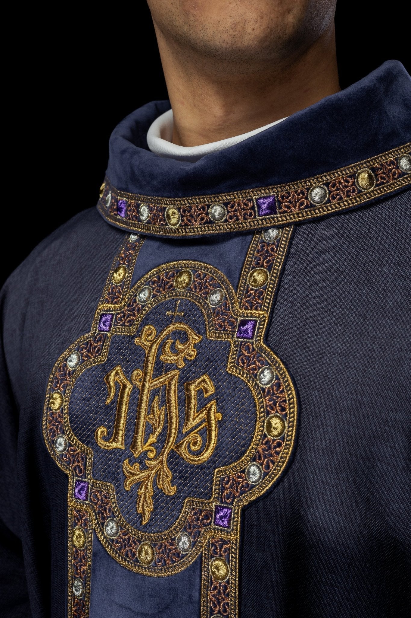 Chasuble with richly embroidered orphrey and piping around the IHS I collar embroidery in purple S - 7067 - 03 - 70 - HAFTINAUSA.COM